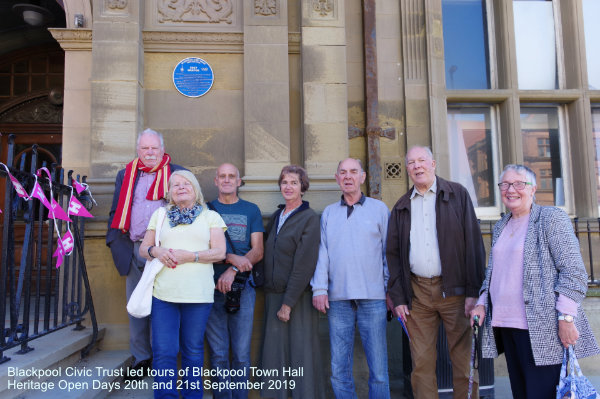 Visitors standing under the Blue Plaque of Lucy Morton on Blackpool Heritage Open Day 21st September 2019